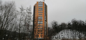 На Сырце жители высотки отапливают квартиры дровами: в чем причина