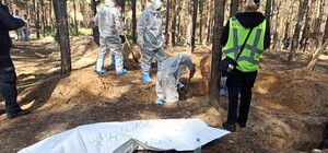 Следы пыток, связаны руки: в Изюме продолжается эксгумация тел погибших (фото, видео)