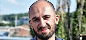 Интервью на балконе с Ежи Конопье: как создавались знаки-