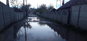 На Амуре вместо дороги болото, а на Титова – огромная яма