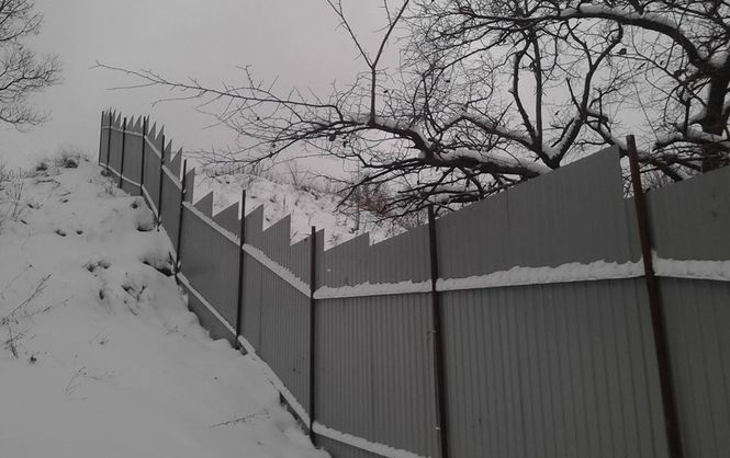 Новость - События - Под шумок: в Киеве начали оперативно демонтировать забор на Щекавице