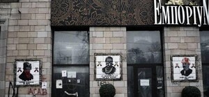 Фотофакт: на Грушевского смыли граффити времен Майдана