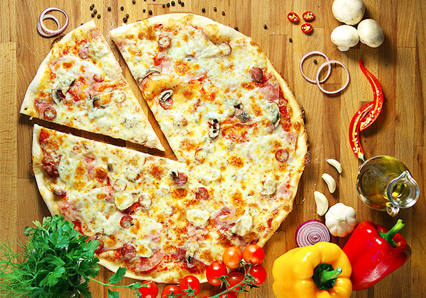 Афиша - Еда - Скидка 50% от Laveton на всю пиццу