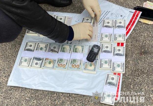 Деньги, которые передали как часть выкупа. Фото: пресс-служба Национальной полиции