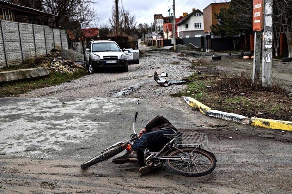 В Сети показали ужасающие фото преступлений оккупантов в Киевской области фото 3