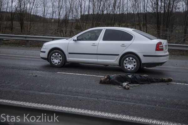 В Сети показали ужасающие фото преступлений оккупантов в Киевской области фото 5